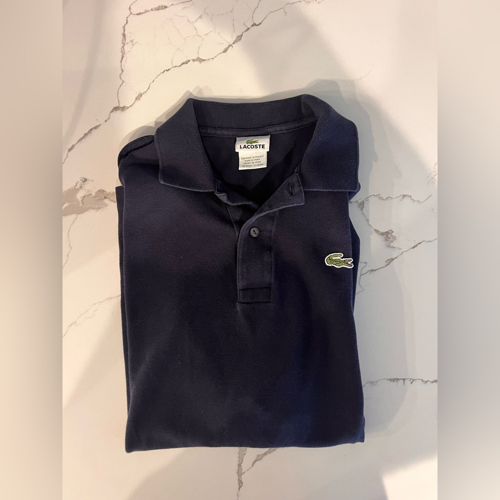 Mens Navy blue Lacoste polo shirt. Size 7- men’s large.